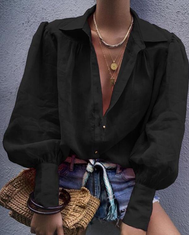 Elegante blusa con cuello en V para una apariencia elegante