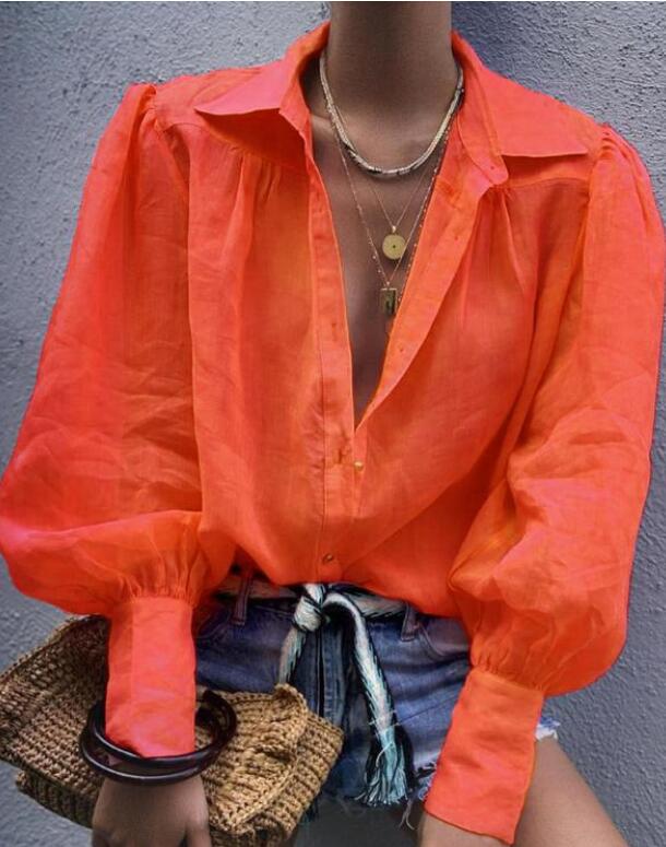 Elegante blusa con cuello en V para una apariencia elegante