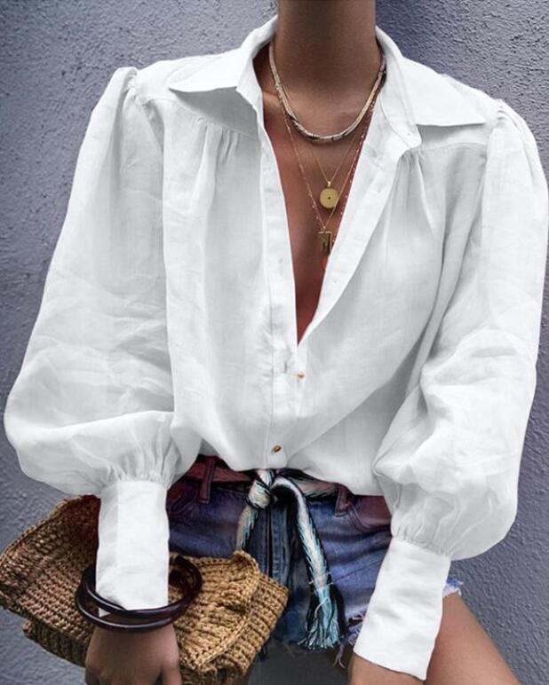 Elegante blusa con cuello en V para una apariencia elegante