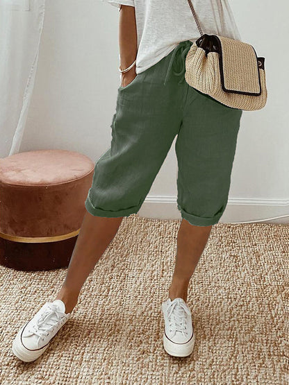 Pantalones casuales con cordón de bolsillos laterales de color sólid